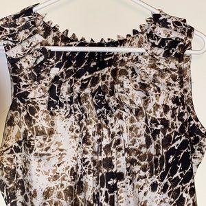 Perfect blouse for day into evening. Very figure flattering. Sz S.  EUC!